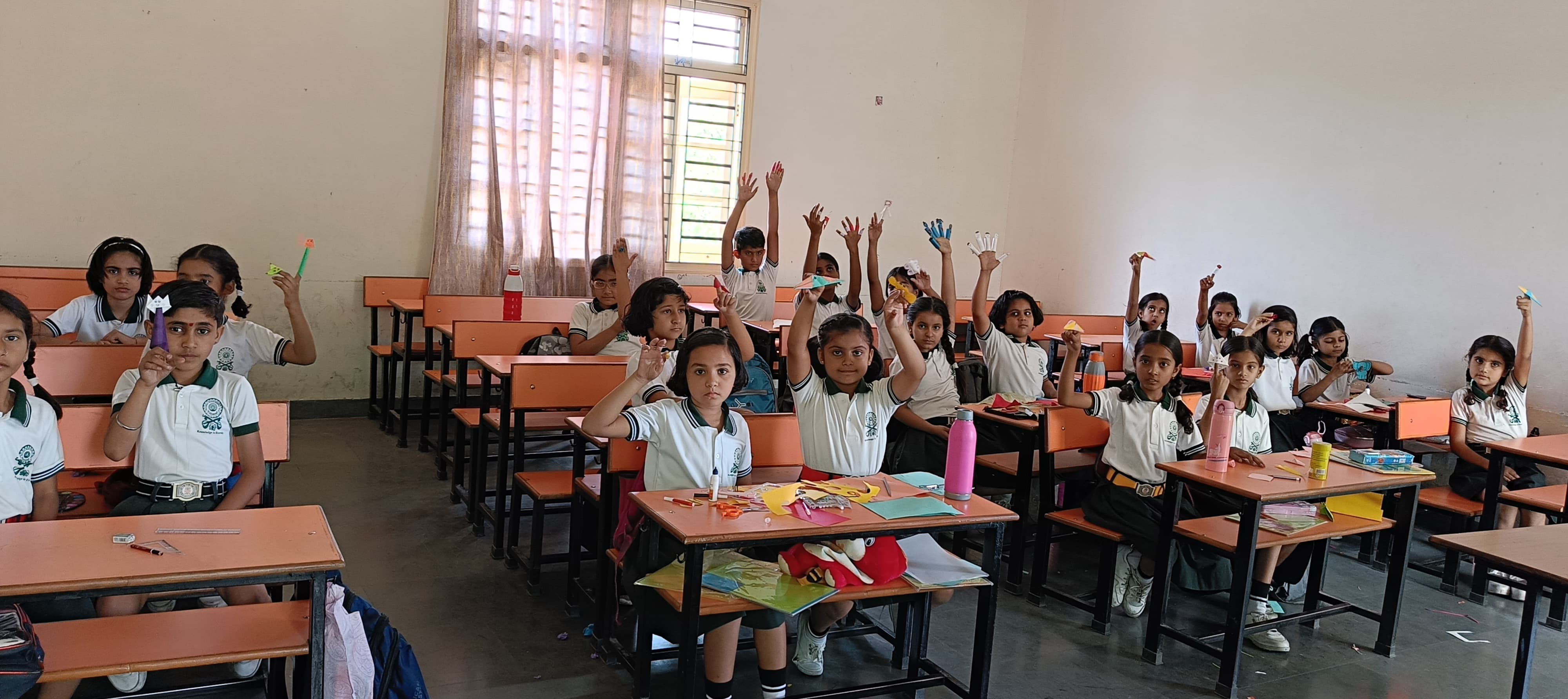 projection room classroom with long tables and display
